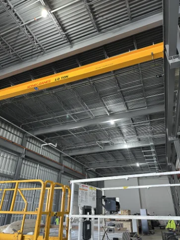 Large-scale commercial facility fire protection build utilizing aerial lifts.